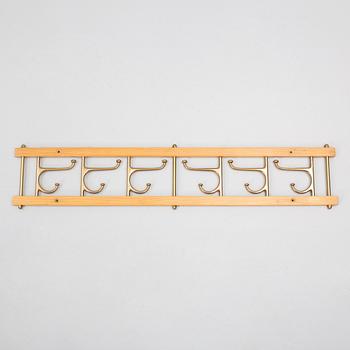 A 'Dekorativ' coat hanger, Skoglunds metallgjuteri, Anderstorp, 1950s/60s.
