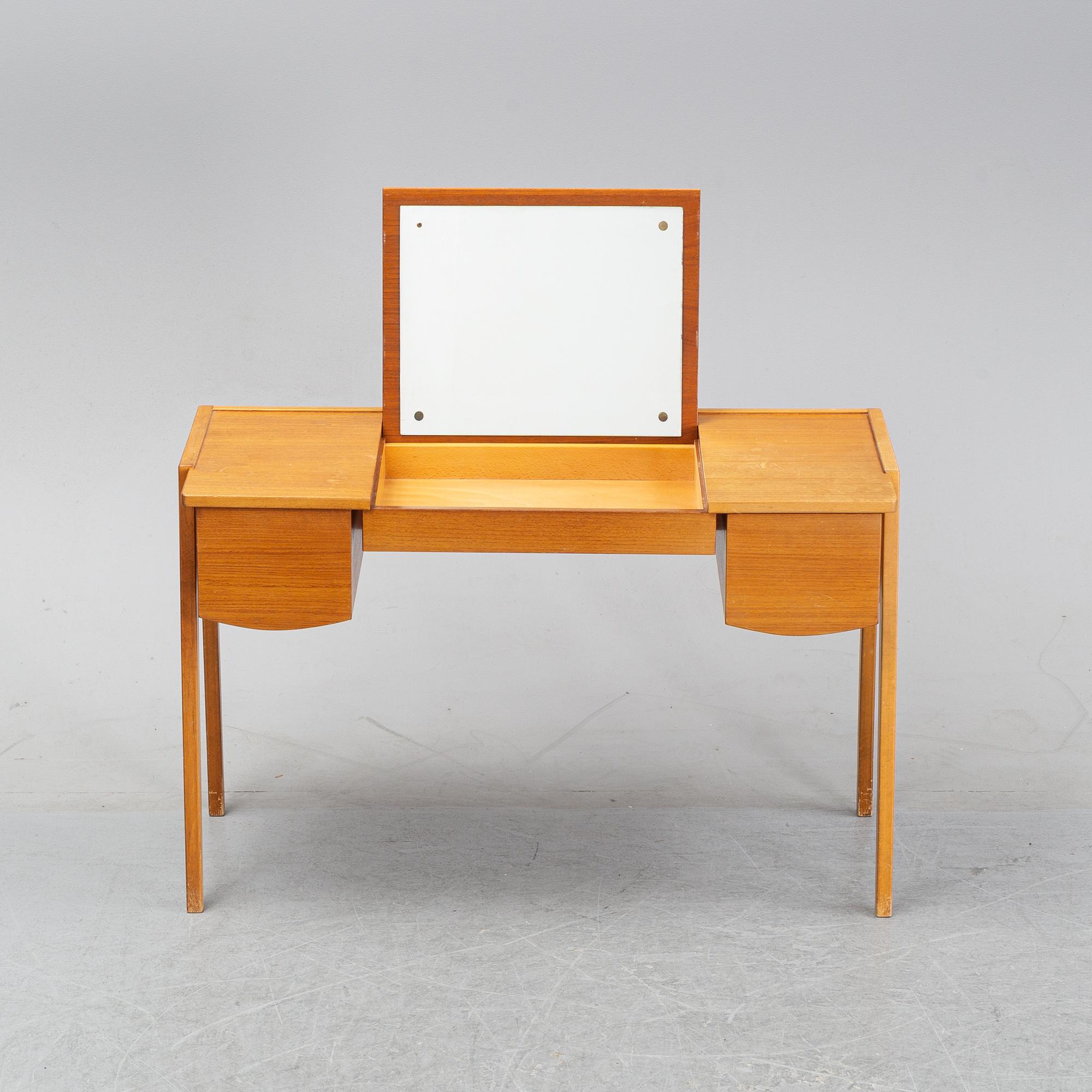 A 1960's teak dressing table.
