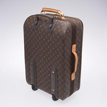 A Monogram Canvas Pégase 55 Suitcase with a Garment Cover.