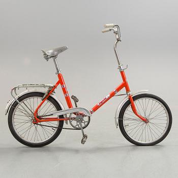 A red Imperial bicycle, 1970s.