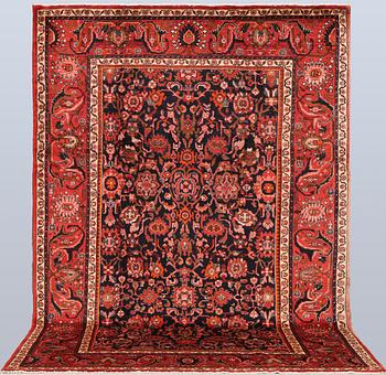 A semi-antique carpet, Nanadj, approx. 309 x 214 cm.