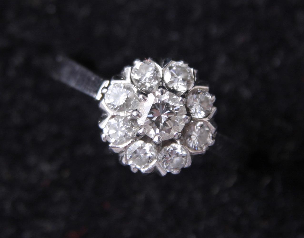 RING, vitguld 18 K med 8+1 diamanter, tot 0,56 ct enl gravyr.