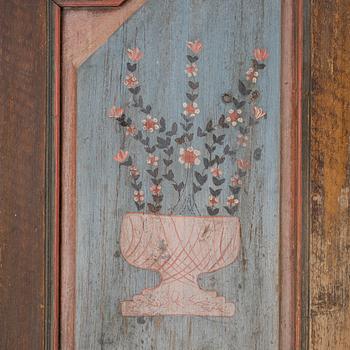 A folk-art cabinet attributed to  "Gammelmålaren" Anders Nilsson (Brunskog, 1807–1889).