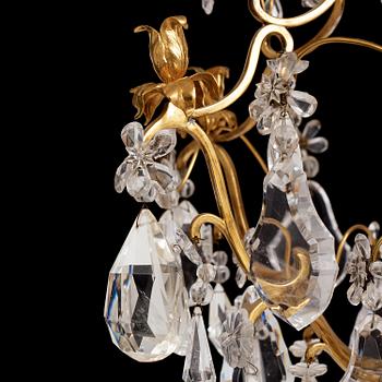 A French Louis XV-style six-branch gilt-bronze, rock crystal and amethyst chandelier, 19th century.