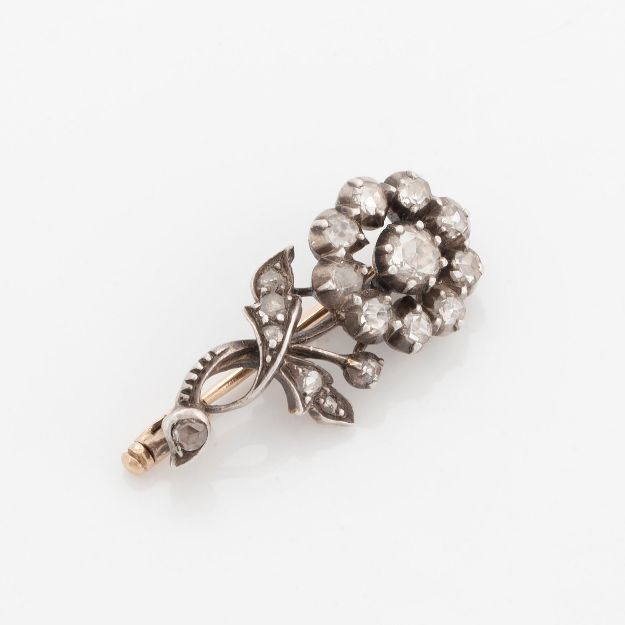 Rose-cut diamond flower brooch.