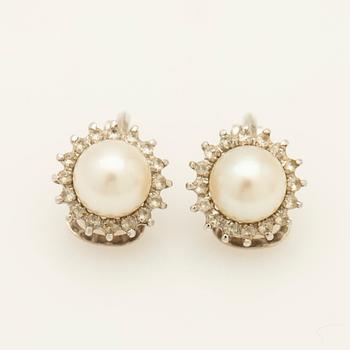 Earrings, a pair, 18K white gold with pearls and diamonds.