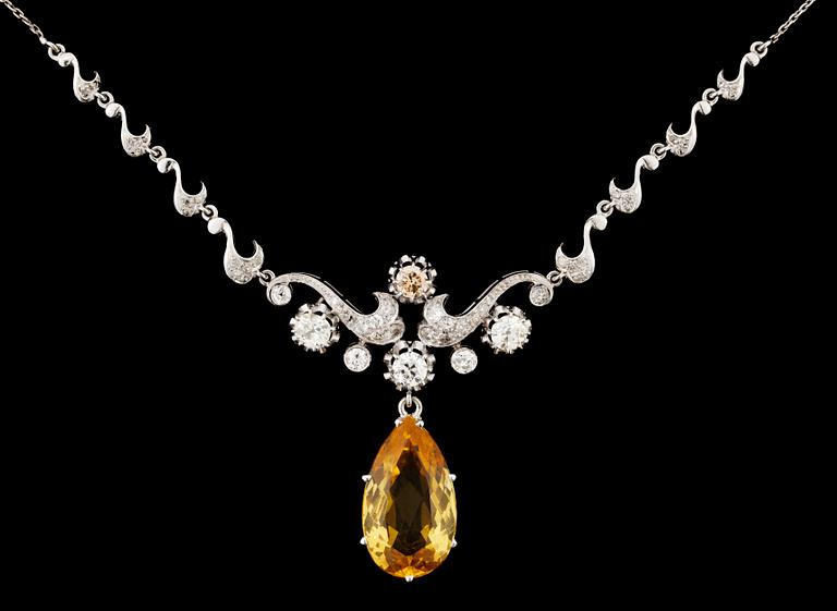 A gold, diamond and citrine necklace.