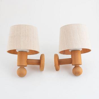 A pair of pine wall lamps, Luxus, 1970's.