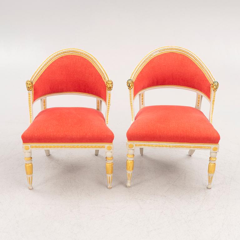 A pair of late Gustavian-style open armchairs, first part 19th century and circa 1900.