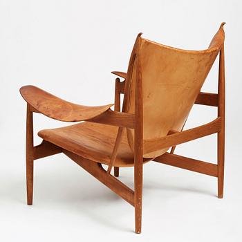 Finn Juhl, a teak and natural brown leather "Chieftain Chair" by Niels Vodder, 1950-60's.