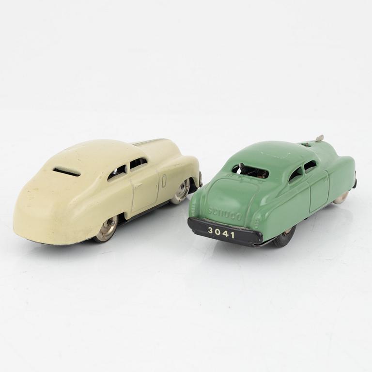 A set of eight toy cars, mostly Schuco, 20th century.