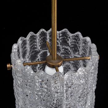 Carl Fagerlund, taklampor, ett par, glas och mässing, Orrefors, 1900-tal.