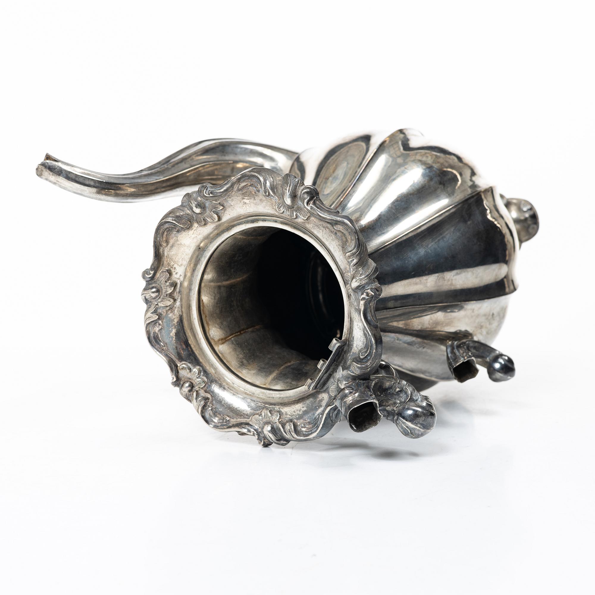 A Swedish silver coffee pot, mark of Christian Hammer, Stockholm 1856.