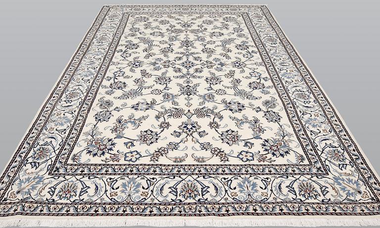A part silk Nain carpet, ca 305 x 198 cm.