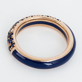 An enamel and brilliant cut diamond ring.