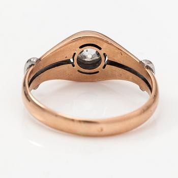A 14K gold ring with a ca. 0.66 ct old-cut diamond.