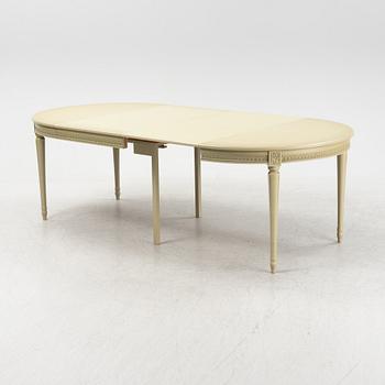 A Gustavian dining table with six chairs. Åmells dated 1974.