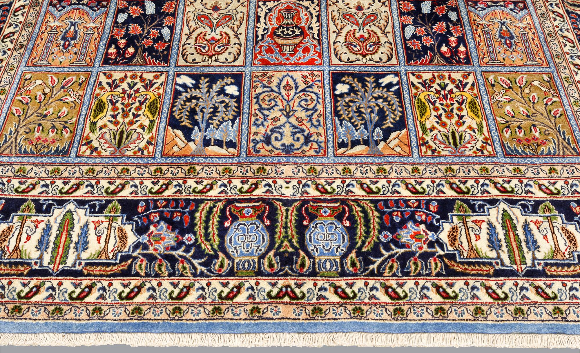 A Figural Sarouk carpet, c. 348 x 240 cm.
