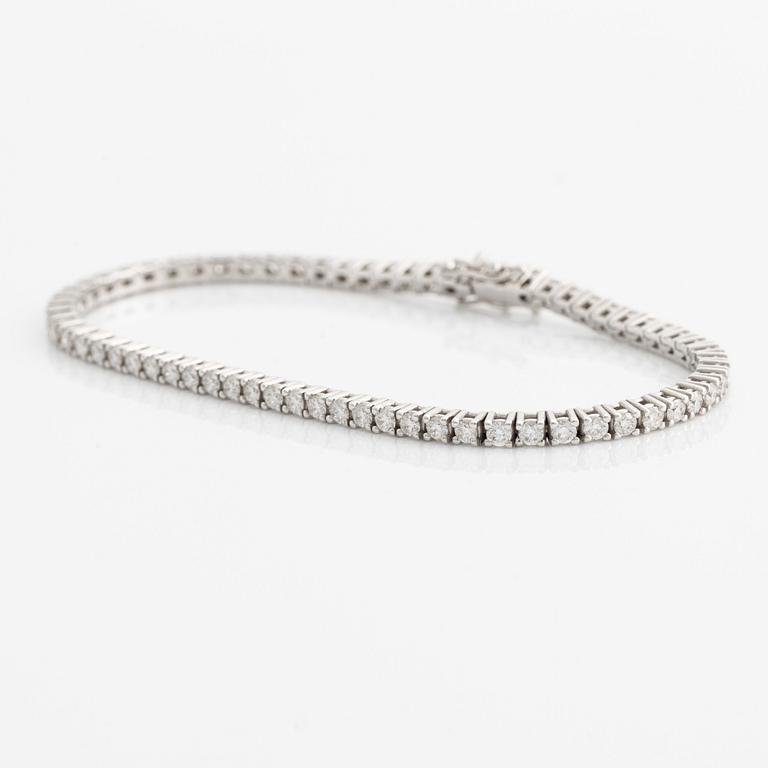 Tennis bracelet, 18K white gold with brilliant-cut diamonds.