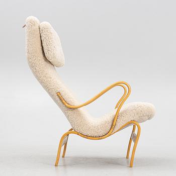 Bruno Mathsson, A 'Pernilla' easy chair with new sheepskin upholstery, by Bruno Mathsson for Firma Karl Mathsson.