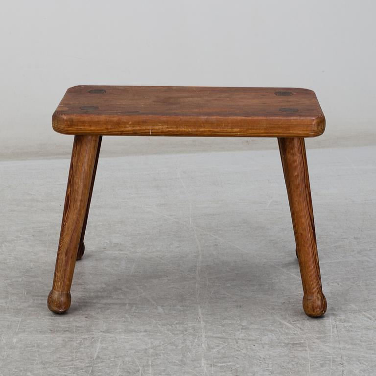 A late 20th Century stool.