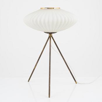 A glass and metal table lamp, probably Italy, 1960s.