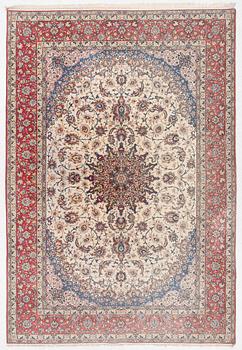 An Isfahan carpet, signed, approx. 372 x 255 cm.