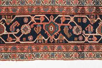 An antique Heriz Serapi carpet, West Persia, c. 616 x 407 cm.