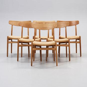 A set of six Hans J Wegner 'CH-23' oak dining chairs, Carl Hansen, Odense, Denmark.