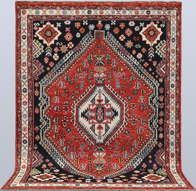 A Shirazi carpet, 237 x 173 cm.