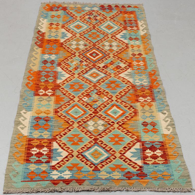A CARPET, Kilim, ca 242 x 88 cm.