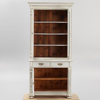 A display cabinet, circa 1900.