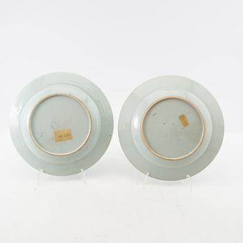 A matched set of four blue and white dinner plates, Qing dynasty, Qianlong (1736-95).