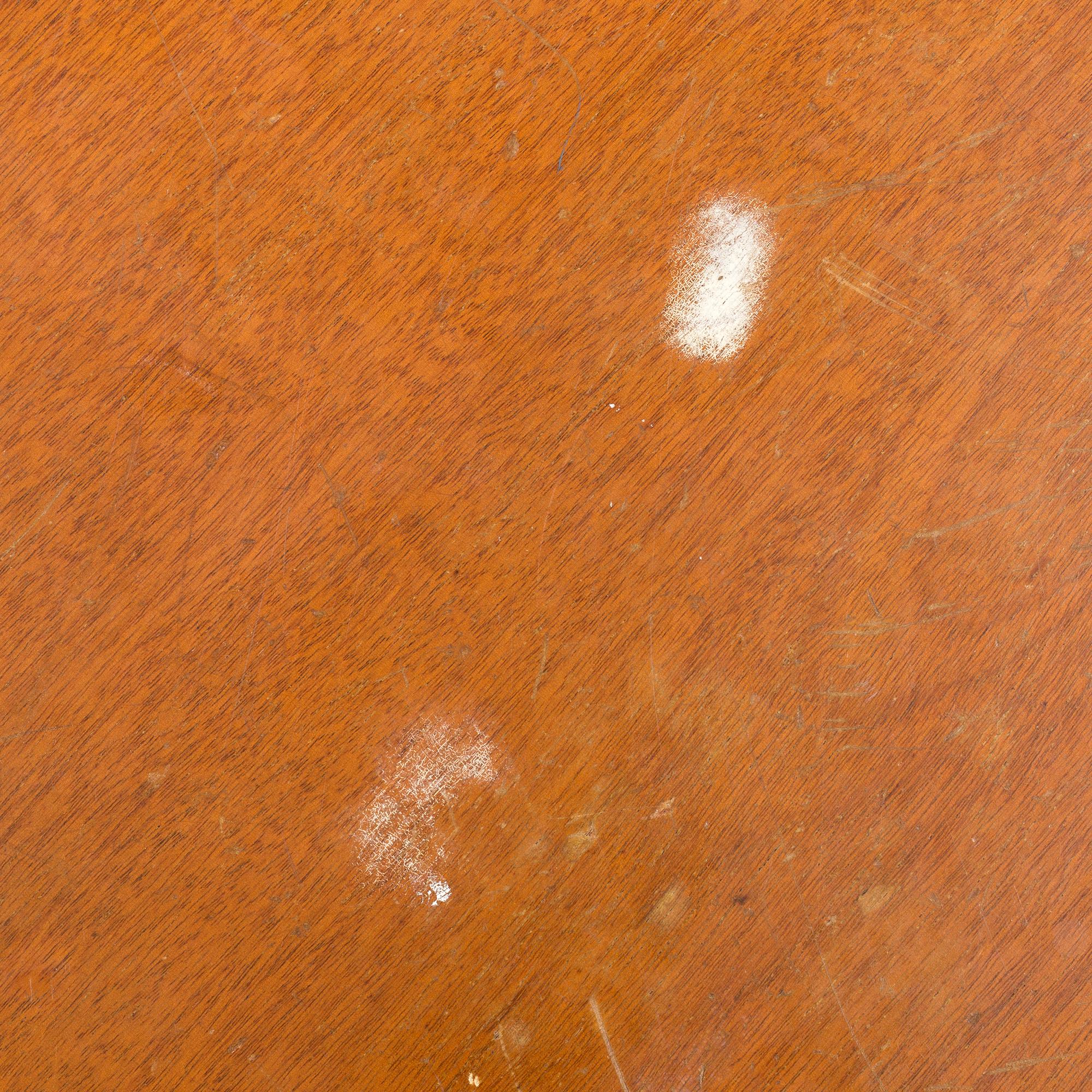 A 1940s mahogany veneer table.