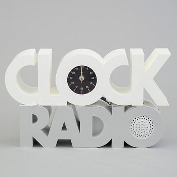 a plastic clock and radio from ISIS, USA, 1980's.