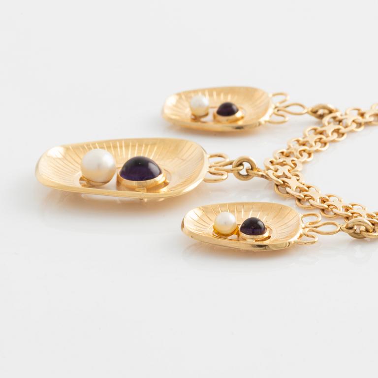 Necklace 18K gold with three pendants, one of which is Stigbert from 1954.