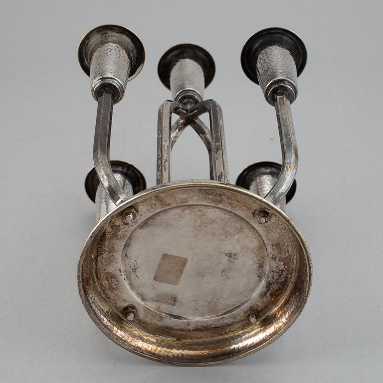 A silver plated candelabrum, early 20th Century.