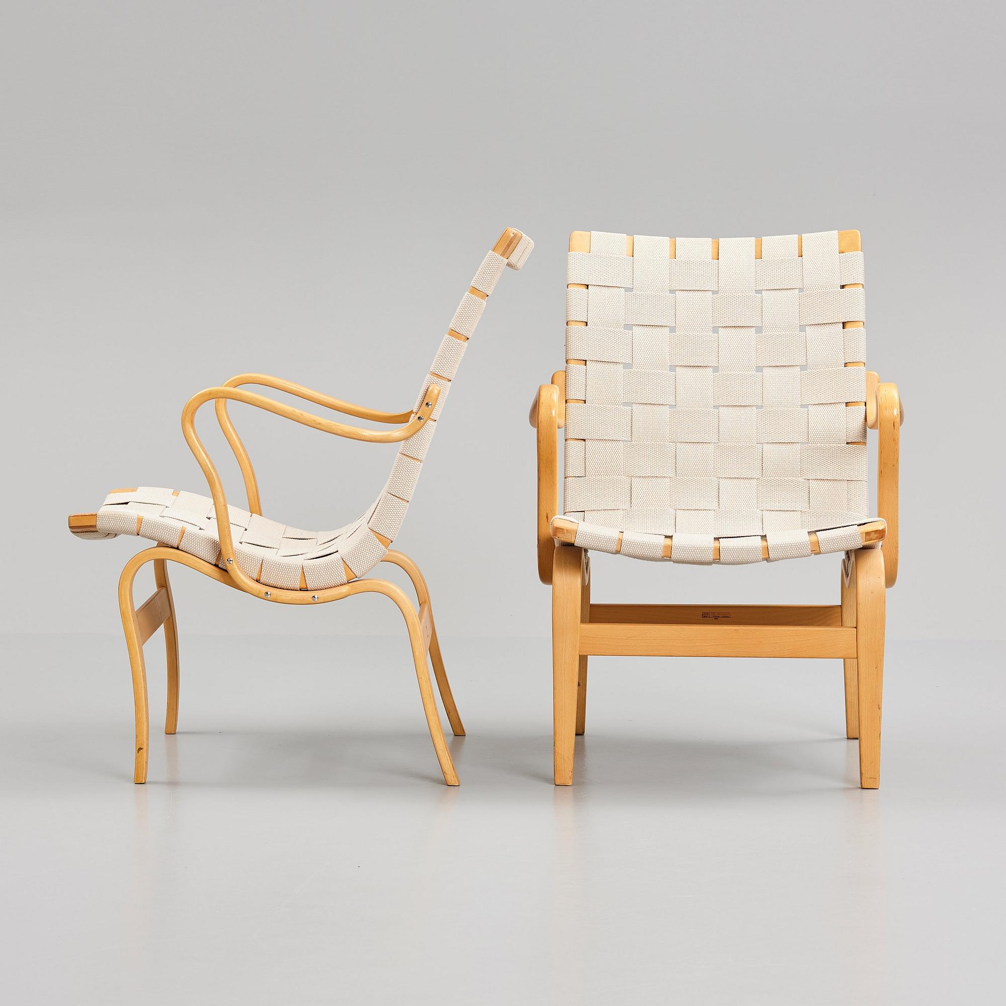 Bruno Mathsson, a pair of bent beech wood and textile girths 'Eva' lounge chairs, Firma Karl Mathsson, Sweden 1967.