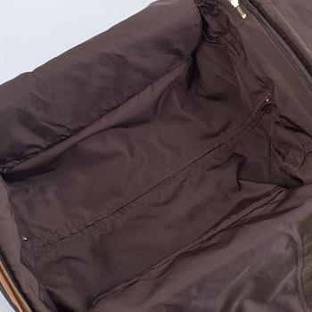 Louis Vuitton,  a monogram canvas 'Pégase 50' suitcase, 2003.