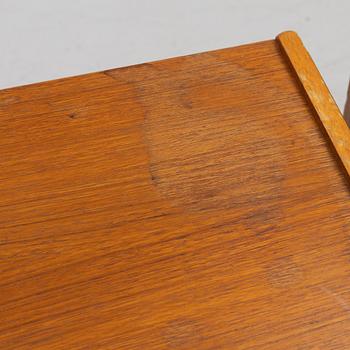 A pair of bedside tables, 1950s.