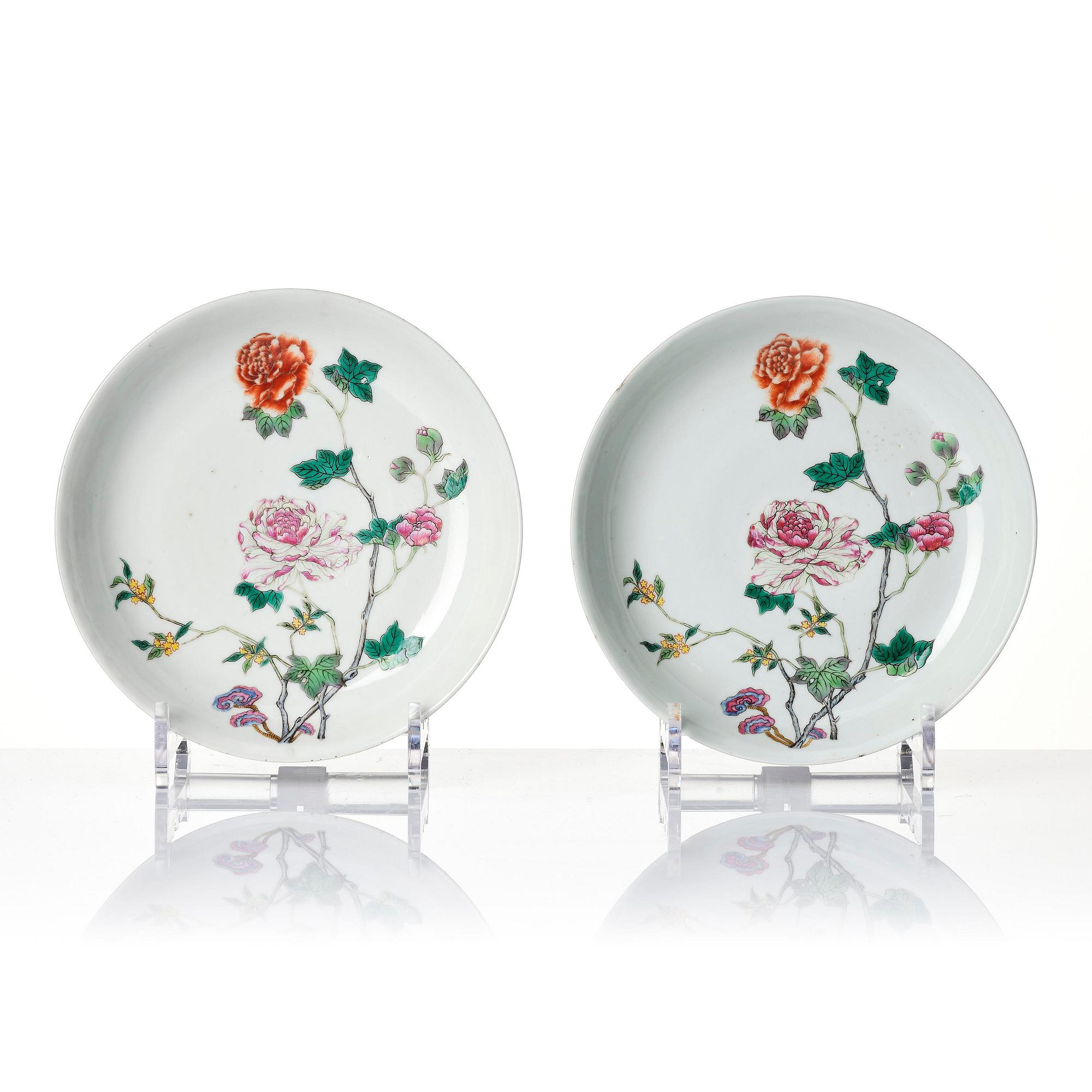 A set of four famille rose floral dishes, Qing dynasty with a apocryphal six character mark.