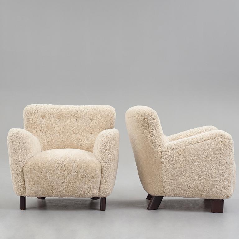 Fritz Hansen, a pair of "1669", easy chairs for Fritz Hansen, Denmark 1940's.