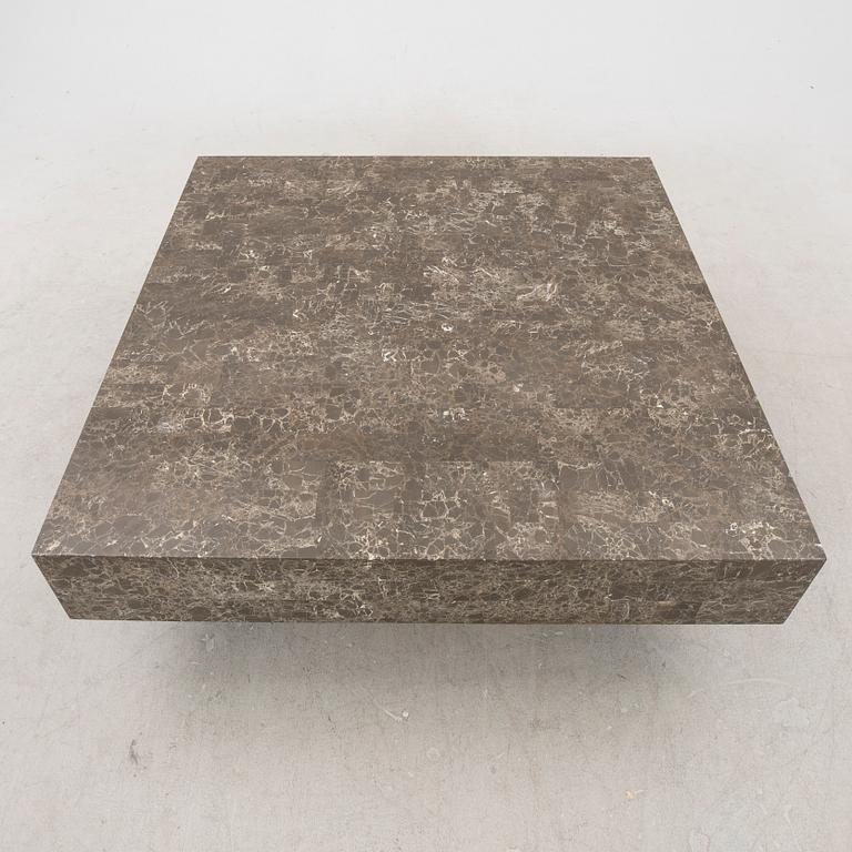 A late 20th century travertine coffee table.