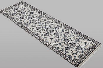 A runner carpet, Nain, part silk, ca 248 x 72 cm.