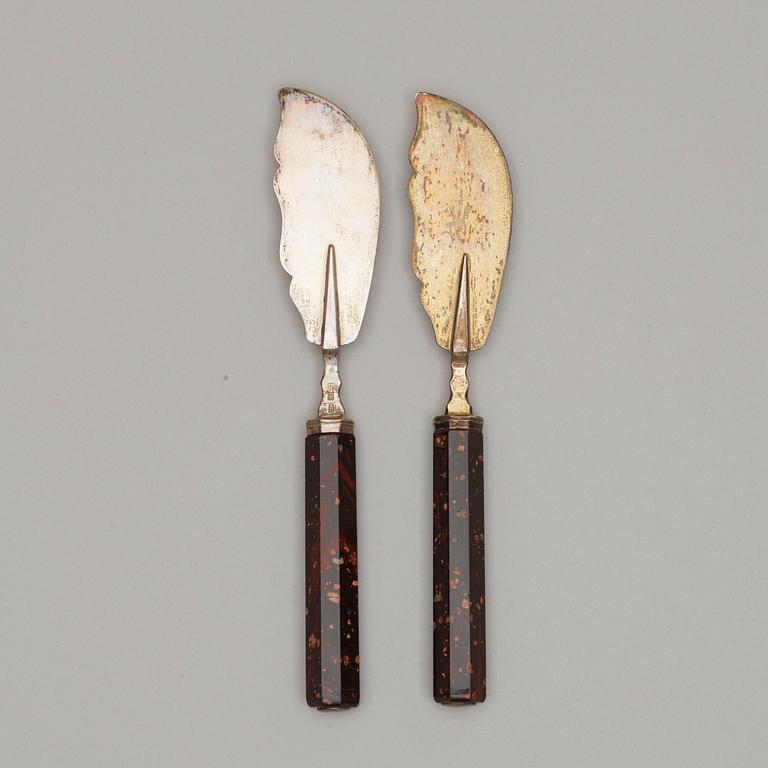 A pair of Swedish Empire 19th century porphyry and silver knives.