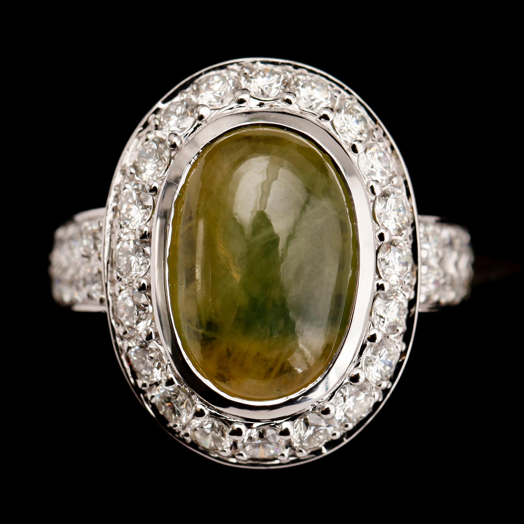 RING, 18 k vitguld, med safir 5.92 ct och briljanter tot 1.04 ct TW.