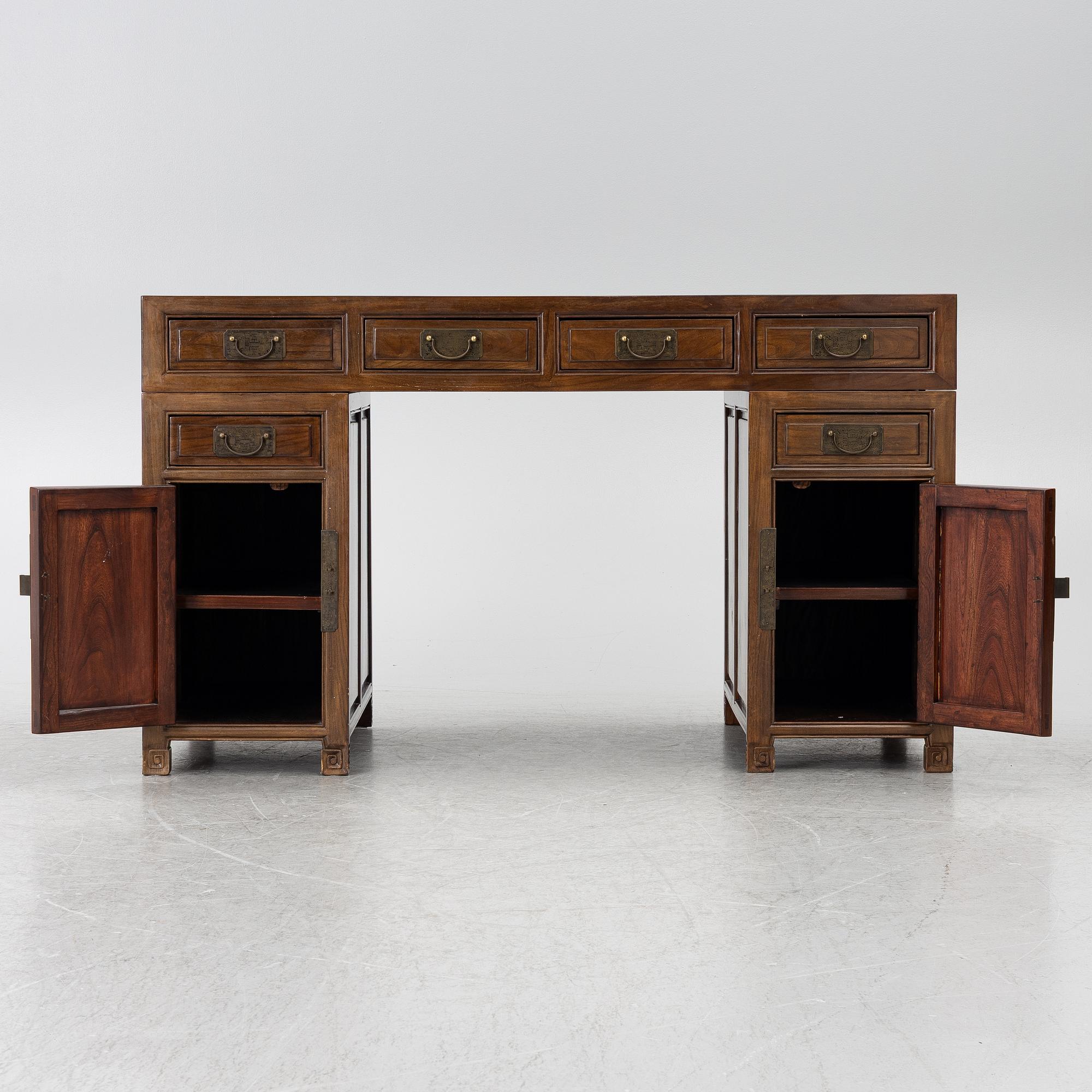 A Chinese hardwood desk, 20th century.