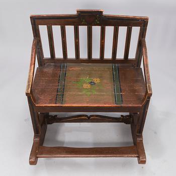 A 19th century wooden rocking chair.