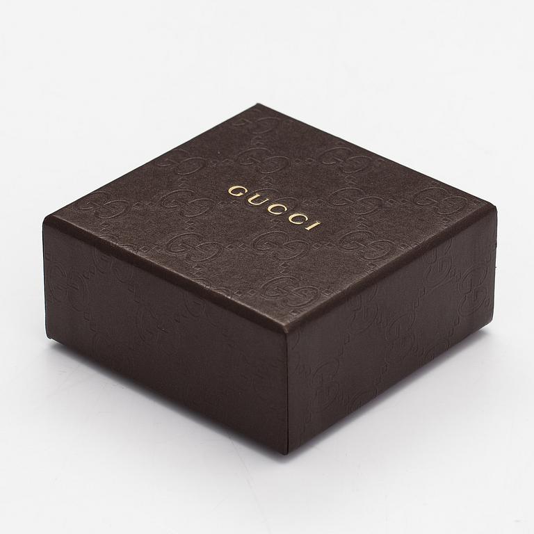 Gucci, A pair of earrings, bracelet, ring and necklace made of sterling silver. Marked Gucci, Made in Italy.