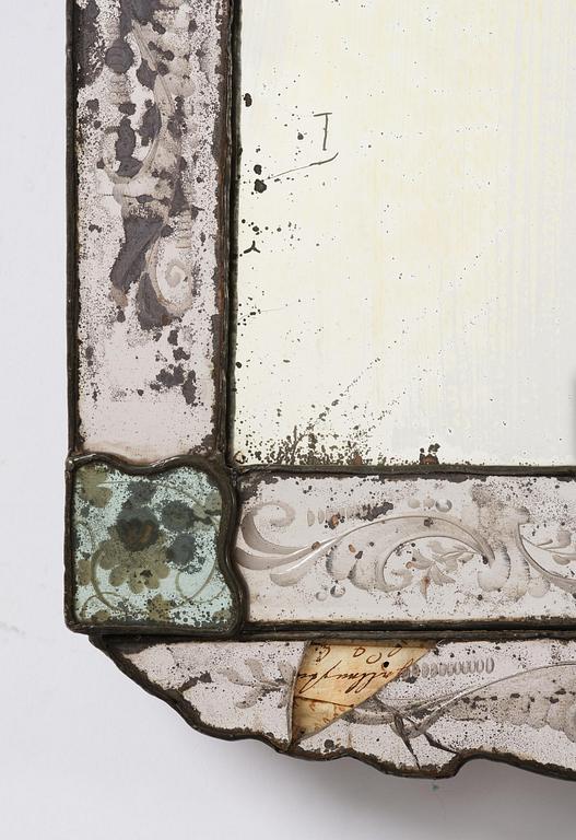 A Northern European late baroque engraved glass mirror, first part 18th century.